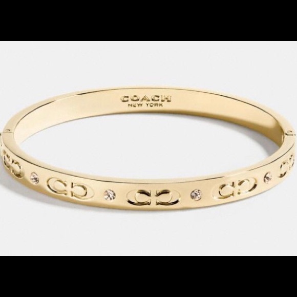 Coach Jewelry - Coach Goldtone KISSING C HINGED BANGLE